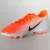 CHUTEIRA CAMPO NIKE VAPOR 12 CLUB (GS) FG INFANTIL LARANJA/BRANCO