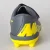 CHUTEIRA NIKE VAPOR 12 CLUB PS V FG INFANTIL CHUMBO/AMARELO