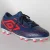CHUTEIRA UMBRO CAMPO VELOX MARINHO/LARANJA