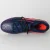CHUTEIRA UMBRO CAMPO VELOX MARINHO/LARANJA