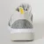 TÊNIS NIKE CK RACER LT FEMININO GRAFITE/BEGE
